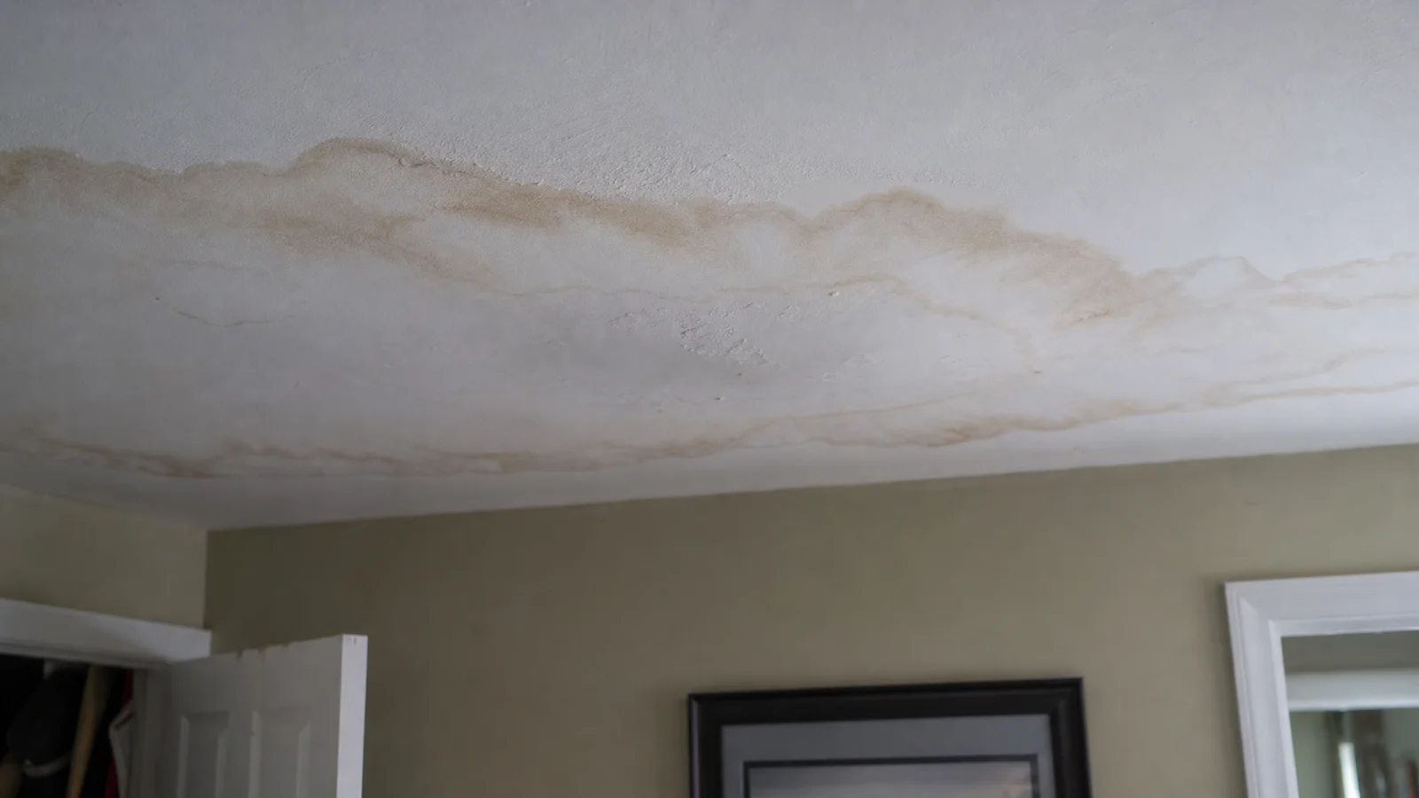 Brown water stain on a home ceiling