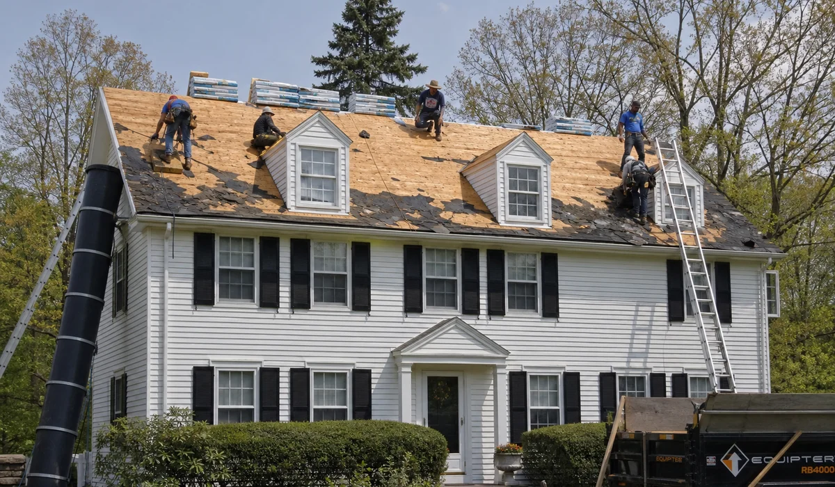 Roof replacement tear-off in progress on a Hartford County colonial home